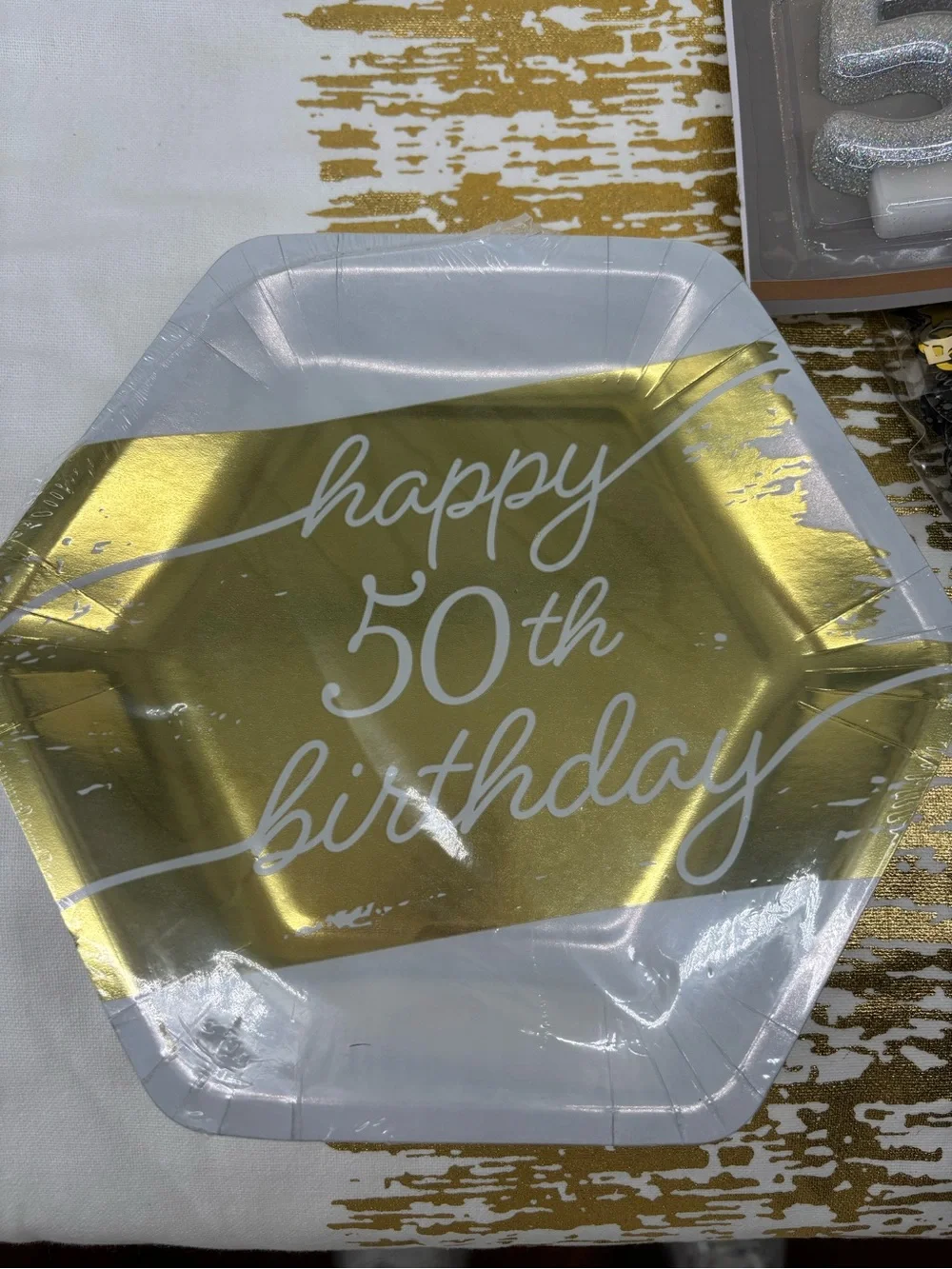 NWT 40 plates, 3 confetti sets, 1 candle 50th birthday kit